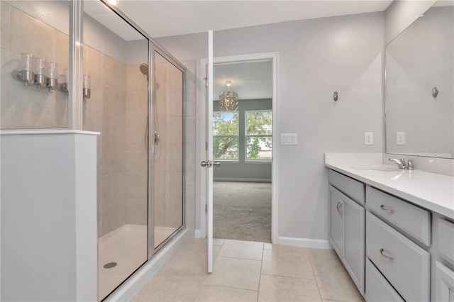 4262 Cloud Hopper Way, Lutz, FL 33559 - bathroom with vanity, a stall shower, and tile patterned flooring