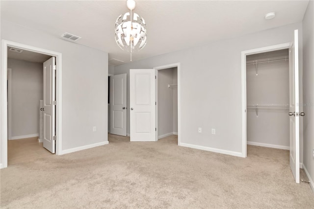 4262 Cloud Hopper Way, Lutz, FL 33559 - unfurnished bedroom featuring carpet and multiple closets
