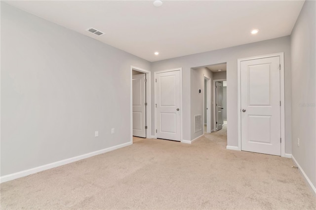 4262 Cloud Hopper Way, Lutz, FL 33559 - unfurnished bedroom with light carpet and recessed lighting