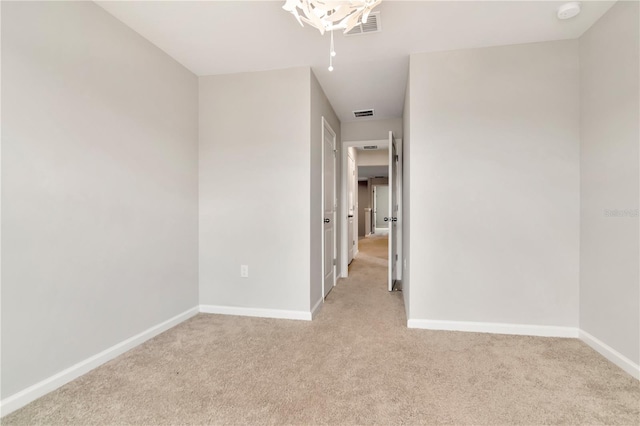 4262 Cloud Hopper Way, Lutz, FL 33559 - empty room featuring light colored carpet and a smoke detector