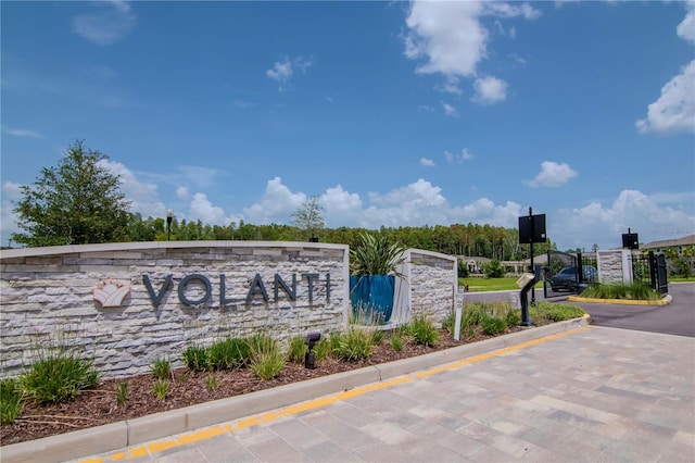 4262 Cloud Hopper Way, Lutz, FL 33559 - community / neighborhood sign featuring a gate