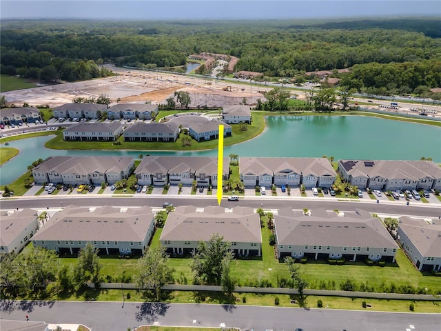 4262 Cloud Hopper Way, Lutz, FL 33559 - aerial view of residential area with a nearby body of water and a heavily wooded area
