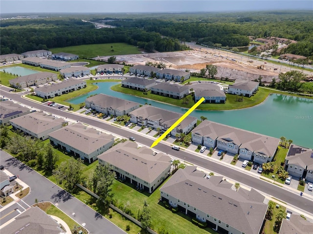 4262 Cloud Hopper Way, Lutz, FL 33559 - aerial view of residential area with a nearby body of water and a heavily wooded area