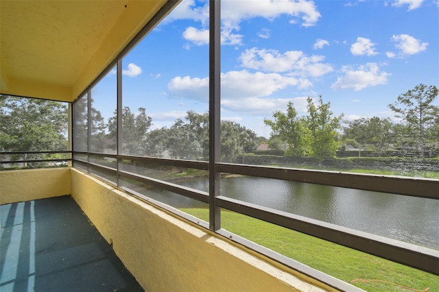 13612 S Village Dr Unit 5201, Tampa, FL 33618 - unfurnished sunroom with a water view