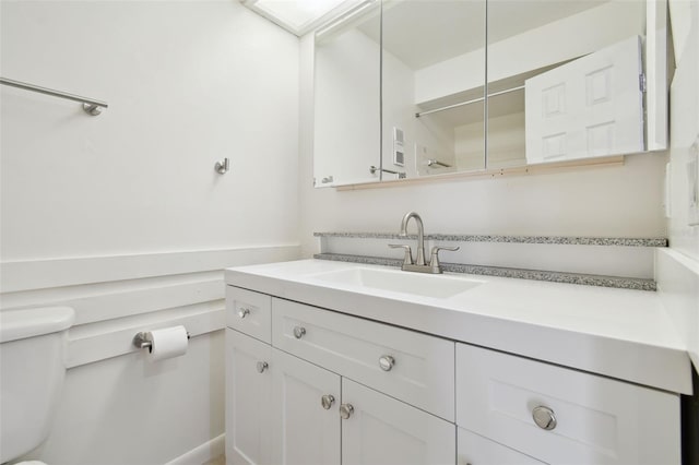 13612 S Village Dr Unit 5201, Tampa, FL 33618 - bathroom featuring toilet and vanity