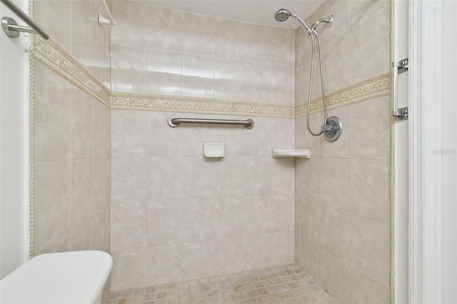 13612 S Village Dr Unit 5201, Tampa, FL 33618 - bathroom featuring tiled shower and toilet