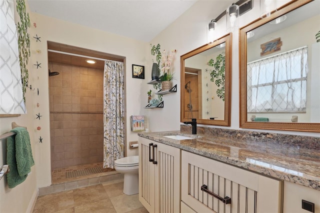 4137 Des Prez Ct, Hernando Beach, FL 34607 - bathroom with toilet, a tile shower, vanity, and baseboards