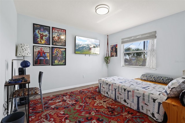 4137 Des Prez Ct, Hernando Beach, FL 34607 - bedroom featuring wood finished floors and baseboards