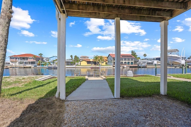 4137 Des Prez Ct, Hernando Beach, FL 34607 - view of patio featuring a water view, boat lift, and a dock