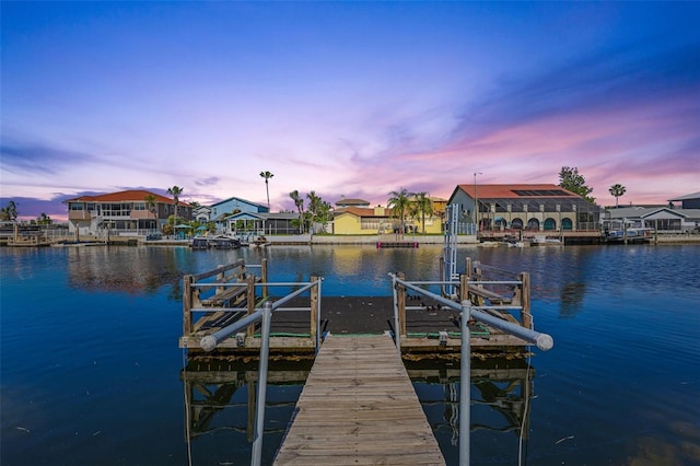 4137 Des Prez Ct, Hernando Beach, FL 34607 - dock featuring boat lift, a water view, and a residential view
