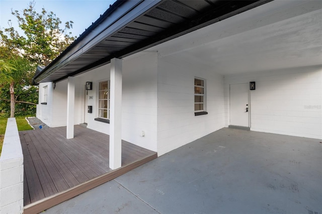 3947 Overlook Dr NE, Saint Petersburg, FL 33703 - wooden terrace featuring a patio area