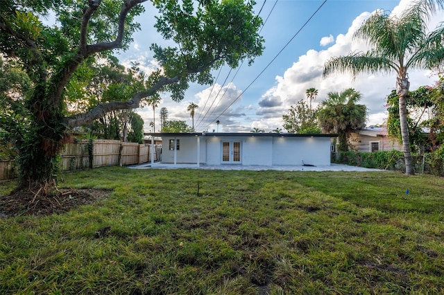 3947 Overlook Dr NE, Saint Petersburg, FL 33703 - back of property featuring french doors and a patio