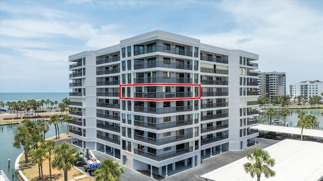 1651 Sand Key Estates Ct Unit 54, Clearwater Beach, FL 33767 - view of apartment building / complex with a water view