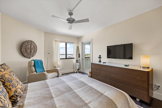 1651 Sand Key Estates Ct Unit 54, Clearwater Beach, FL 33767 - bedroom with access to exterior, baseboards, ceiling fan, and dark wood-style flooring