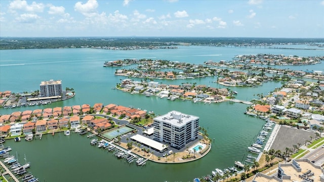 1651 Sand Key Estates Ct Unit 54, Clearwater Beach, FL 33767 - drone / aerial view of a nearby body of water and a marina