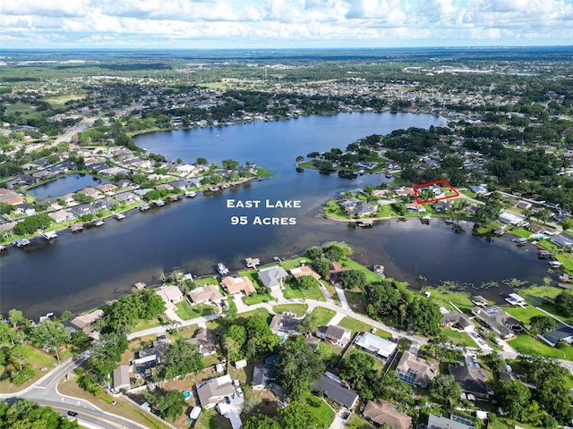 3724 Fawn Grove Ct, Land O Lakes, FL 34639 - aerial overview of property's location with a nearby body of water and nearby suburban area