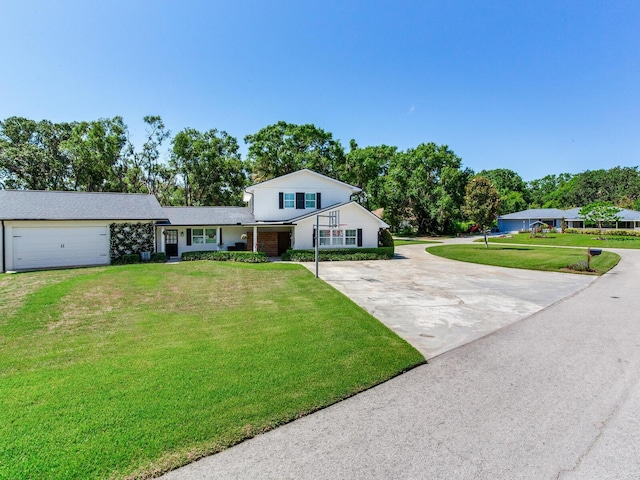 3724 Fawn Grove Ct, Land O Lakes, FL 34639 - view of front facade featuring driveway and a front lawn