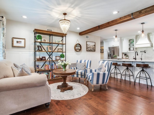 3724 Fawn Grove Ct, Land O Lakes, FL 34639 - living area with beam ceiling, wainscoting, recessed lighting, dark wood finished floors, and a chandelier