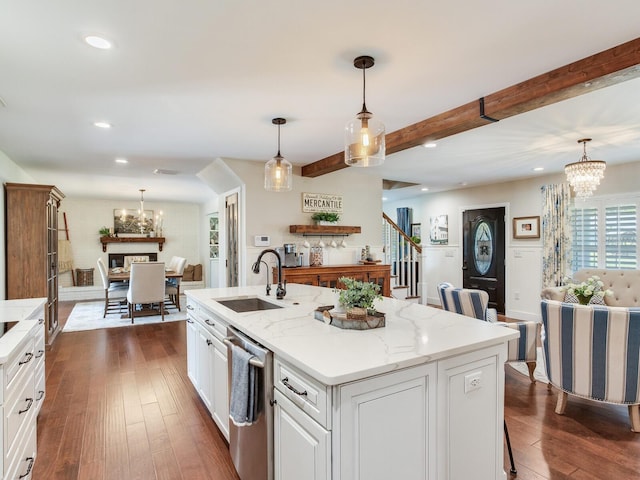 3724 Fawn Grove Ct, Land O Lakes, FL 34639 - kitchen with a chandelier, a sink, dishwasher, white cabinets, and dark wood-style flooring