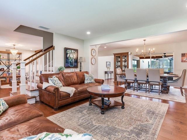 3724 Fawn Grove Ct, Land O Lakes, FL 34639 - living area with a chandelier, stairs, recessed lighting, and wood finished floors