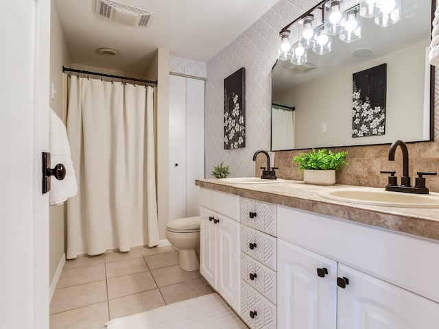 3724 Fawn Grove Ct, Land O Lakes, FL 34639 - bathroom featuring toilet, double vanity, tile patterned floors, a shower with shower curtain, and backsplash