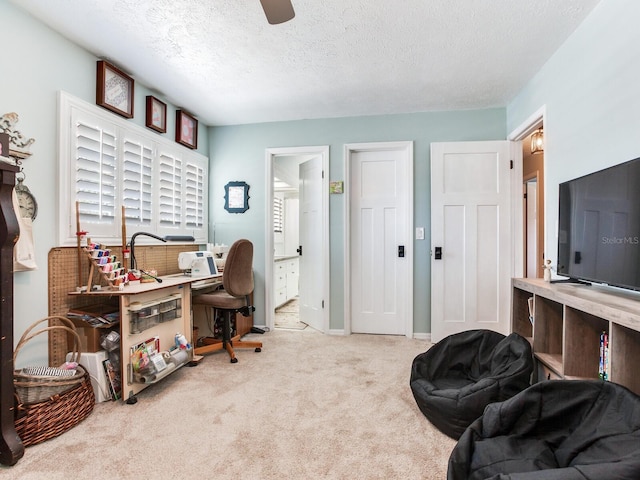3724 Fawn Grove Ct, Land O Lakes, FL 34639 - office space with carpet floors, a textured ceiling, a ceiling fan, and baseboards