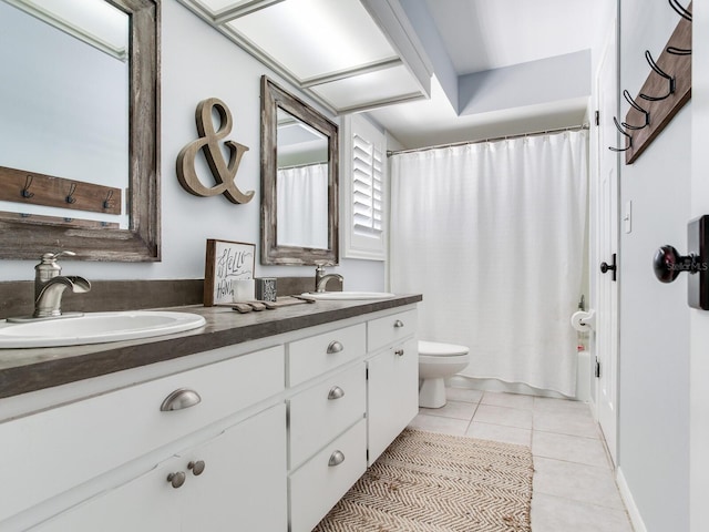 3724 Fawn Grove Ct, Land O Lakes, FL 34639 - full bath with double vanity, toilet, and tile patterned floors