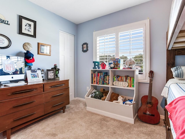 3724 Fawn Grove Ct, Land O Lakes, FL 34639 - bedroom featuring light carpet, baseboards, and a closet