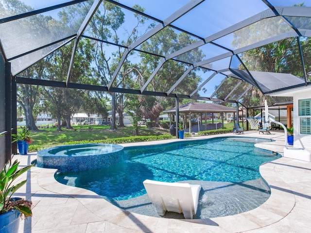3724 Fawn Grove Ct, Land O Lakes, FL 34639 - view of pool featuring a patio area, a gazebo, a pool with connected hot tub, and glass enclosure