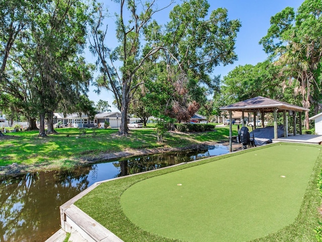 3724 Fawn Grove Ct, Land O Lakes, FL 34639 - view of property's community with a gazebo, a putting green, and a water view