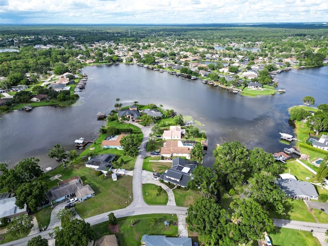 3724 Fawn Grove Ct, Land O Lakes, FL 34639 - aerial overview of property's location with nearby suburban area and a large body of water