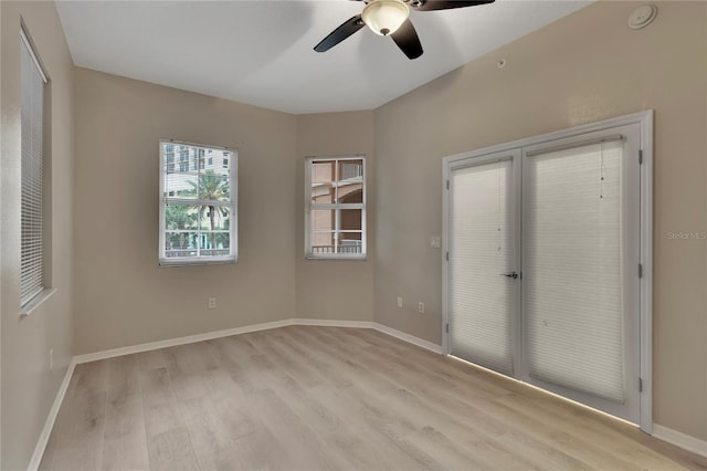 530 S Gulfview Blvd Unit 203, Clearwater Beach, FL 33767 - unfurnished bedroom with light wood-type flooring, baseboards, and a ceiling fan