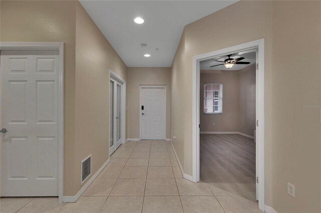 530 S Gulfview Blvd Unit 203, Clearwater Beach, FL 33767 - hall with baseboards, light tile patterned floors, and recessed lighting