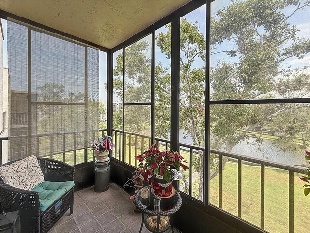 5920 80th St N Unit 406, Saint Petersburg, FL 33709 - sunroom / solarium with a water view