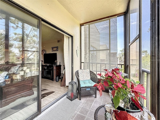 5920 80th St N Unit 406, Saint Petersburg, FL 33709 - sunroom with a textured wall and a textured ceiling