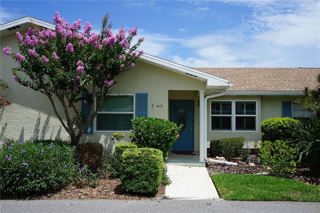413 Lake Point Ct Unit 4B, Sun City Center, FL 33573 - view of front of property with stucco siding