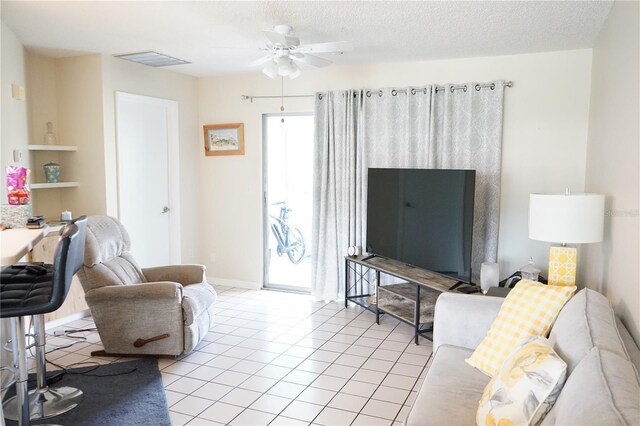413 Lake Point Ct Unit 4B, Sun City Center, FL 33573 - living room featuring light tile patterned floors and a ceiling fan