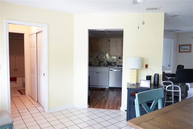 413 Lake Point Ct Unit 4B, Sun City Center, FL 33573 - dining area featuring light tile patterned floors and baseboards