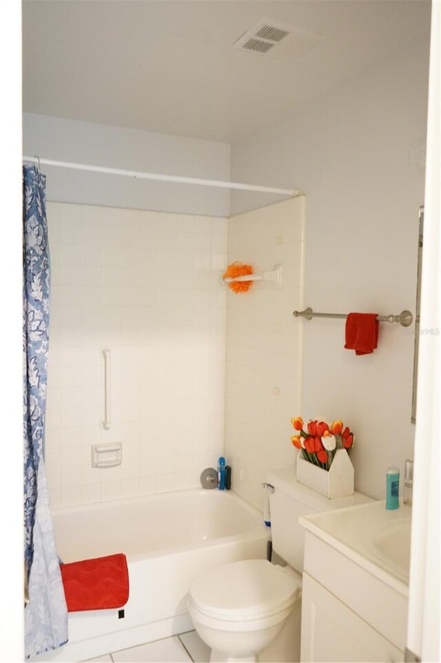 413 Lake Point Ct Unit 4B, Sun City Center, FL 33573 - full bathroom with vanity, shower / tub combo, toilet, and tile patterned floors