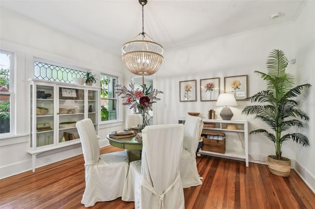 848 9th Ave S, Saint Petersburg, FL 33701 - dining room featuring a chandelier, healthy amount of natural light, and hardwood / wood-style flooring