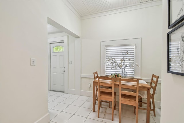 848 9th Ave S, Saint Petersburg, FL 33701 - dining space featuring crown molding, light tile patterned flooring, and baseboards