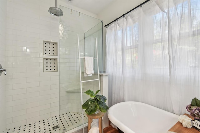 848 9th Ave S, Saint Petersburg, FL 33701 - full bathroom featuring a tile shower and a soaking tub