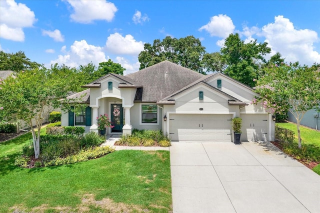 679 Challice Dr, Spring Hill, FL 34609 - view of front of house with stucco siding, a front lawn, an attached garage, concrete driveway, and a shingled roof