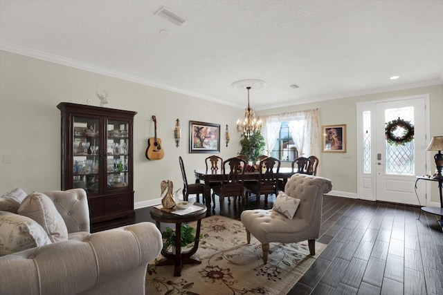 679 Challice Dr, Spring Hill, FL 34609 - living area with a chandelier, baseboards, dark wood-type flooring, and crown molding