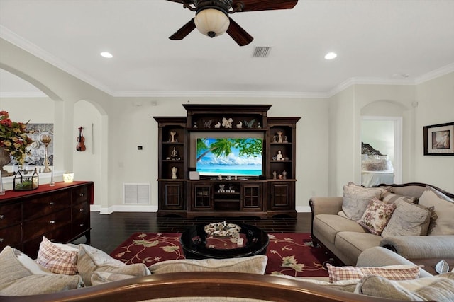 679 Challice Dr, Spring Hill, FL 34609 - living room with arched walkways, baseboards, a ceiling fan, recessed lighting, and ornamental molding