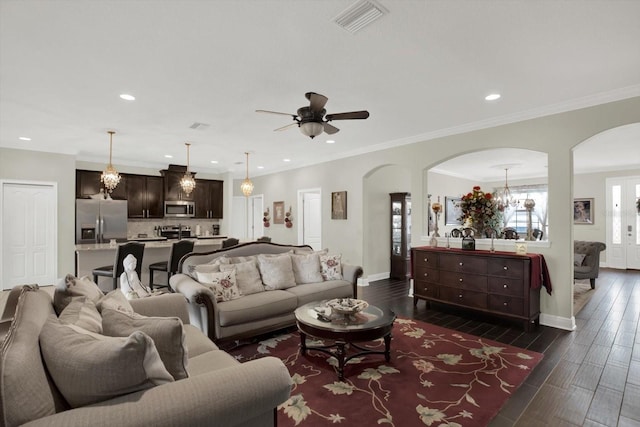 679 Challice Dr, Spring Hill, FL 34609 - living area with arched walkways, recessed lighting, baseboards, a chandelier, and a ceiling fan