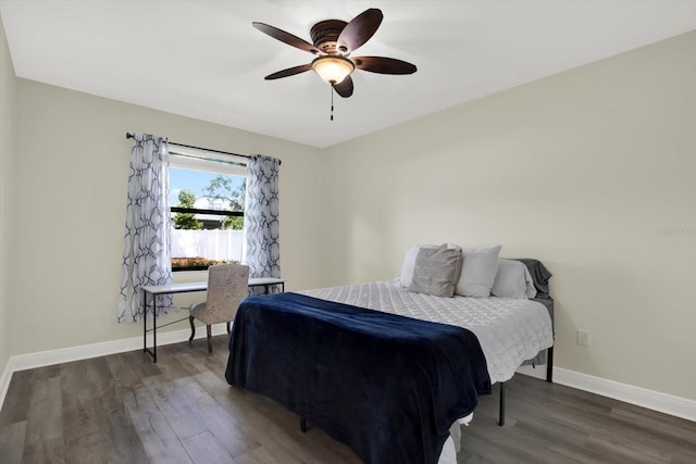 679 Challice Dr, Spring Hill, FL 34609 - bedroom with wood finished floors, baseboards, and ceiling fan