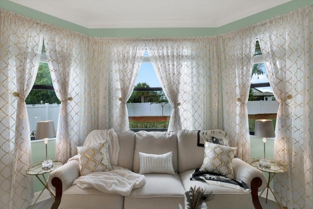 679 Challice Dr, Spring Hill, FL 34609 - living area with healthy amount of natural light and crown molding