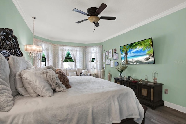 679 Challice Dr, Spring Hill, FL 34609 - bedroom with a chandelier, crown molding, wood finished floors, baseboards, and ceiling fan