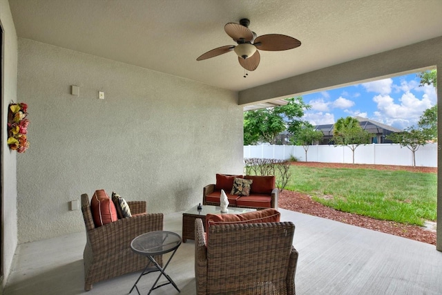 679 Challice Dr, Spring Hill, FL 34609 - view of patio featuring ceiling fan and an outdoor living space